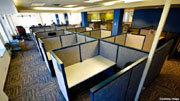 Things are pretty quiet in this small cubicle farm in Portland, Oregon - but only because no one’s working there right now. (Asa Wilson, Wikipedia Commons)