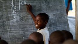 A young Congolese boy at the Mugosi Primary School which mainly serves children of the Kahe refugee camp in 