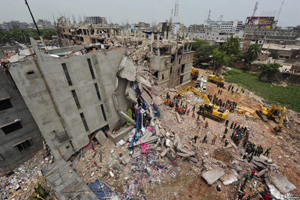 Rescue workers attempt to find survivors from the rubble of the collapsed Rana Plaza building in 2013.