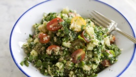 A dish of tabbouleh filled with herbs and spices. (AP Photo/Matthew Mead)