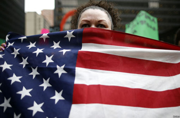 A protester calls for immigration reform at a rally in Chicago, Illinois, March 27, 2014.